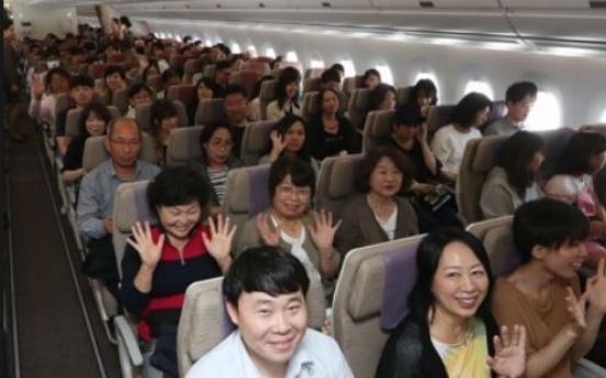 Koreans give themselves low scores on travel etiquette