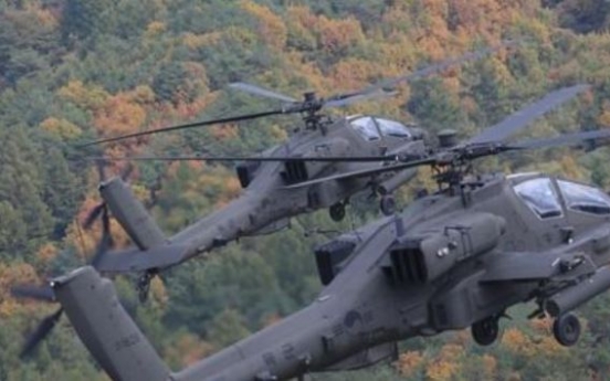 Korean Army tests missile firing from Apache helicopters