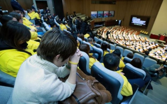 Parliament passes law to reinvestigate Sewol sinking