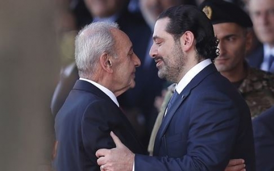 Lebanese PM Hariri revokes resignation after consensus deal