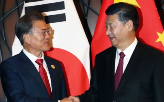 Moon due in China for summit with Xi over N. Korea, bilateral ties