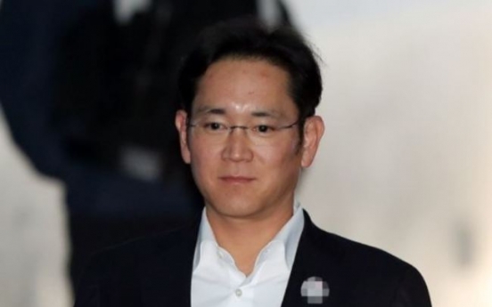 Prosecutors keep 12 yr jail term demand for Samsung heir in appeals trial