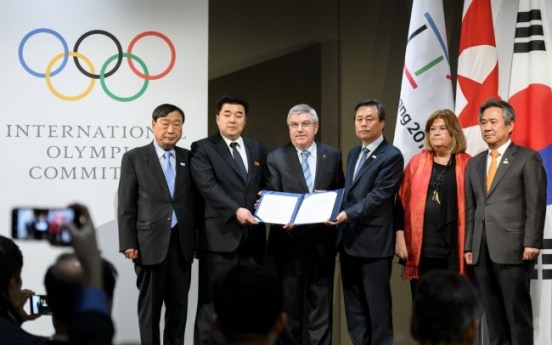 Talks open at Korean Olympic unity meeting in Switzerland