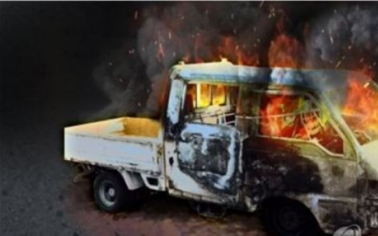 Suspect arrested for burning truck after fighting with wife