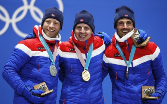 [Photo News] Norway sweeps gold, silver and bronze at men‘s 30 km skiathlon