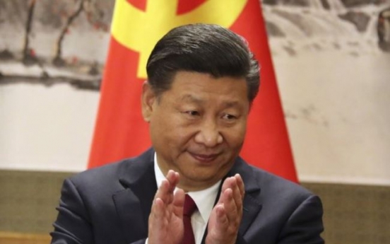 China paves way for Xi Jinping to remain leader for years