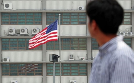 Two protesters apprehended after attempting to charge into US Embassy