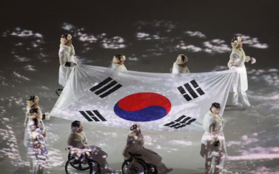 S. Korean Paralympic heroes bring national flag into opening ceremony