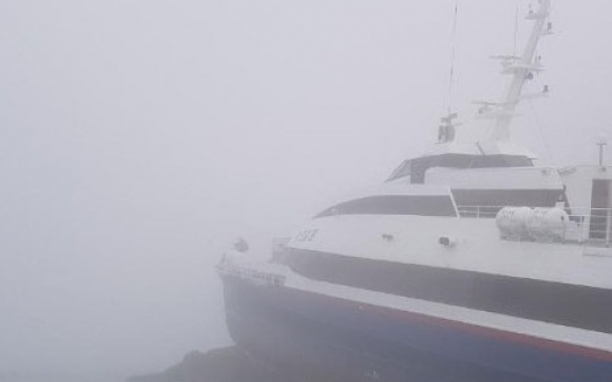 Ferry grounded on rocks off the coast of Sinan