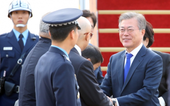 President Moon returns from trip to Vietnam, UAE