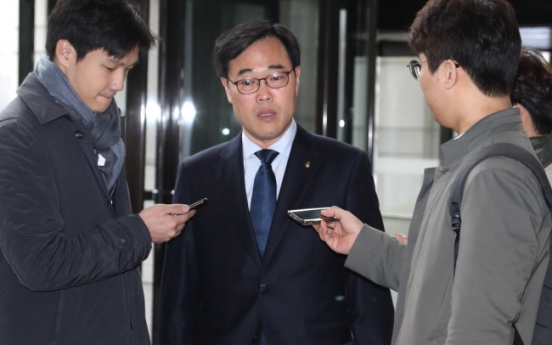 Head of financial watchdog apologizes again over sponsored overseas trips