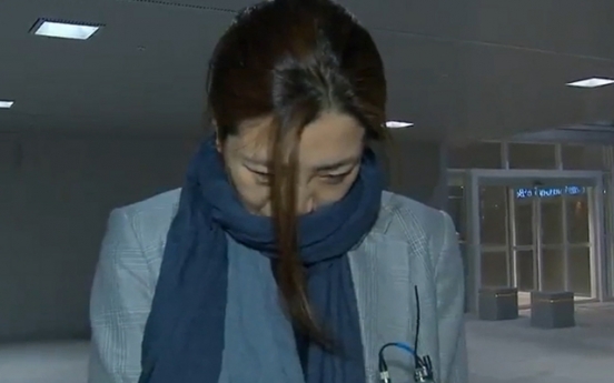 Korean Air heiress returns home to barrage of criticisms, probe for violence