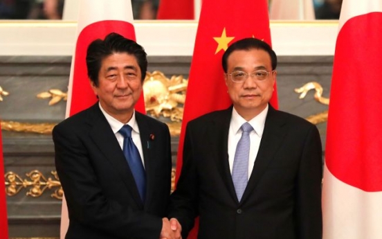 Japan’s Abe accepts China invite, but no date set