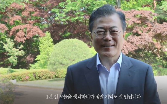 Moon quietly marks first year in office