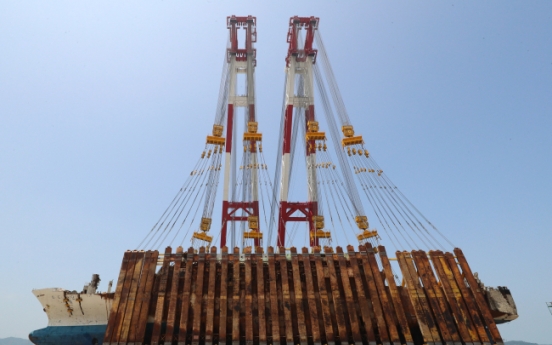 Sewol ferry set upright for further search of victims