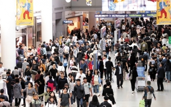 Households' overseas spending rises up