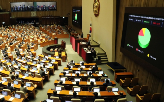 [Newsmaker] Parliament OKs bills on extra budget, special counsel probe