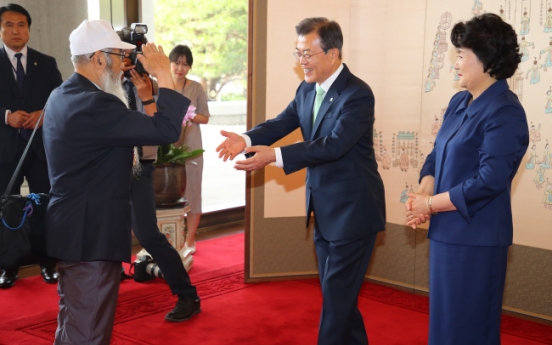 Moon vows continued support for national heroes, war veterans