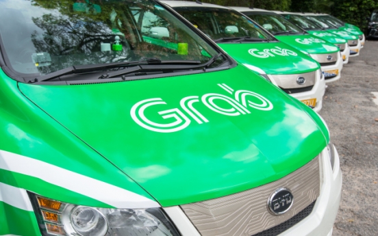 [From the Scene] Ride-hailing giant Grab joins hands with SK for lead in future mobility