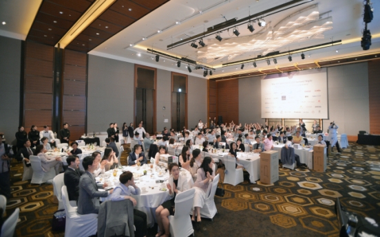 CEOs serve tables for AmCham charity night