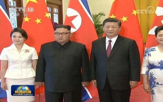 N. Korean leader Kim holds summit with Xi