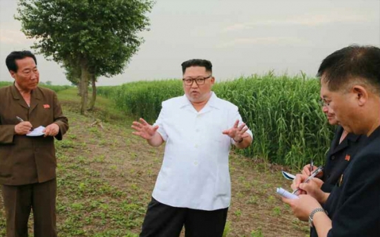 NK leader inspects island areas near China