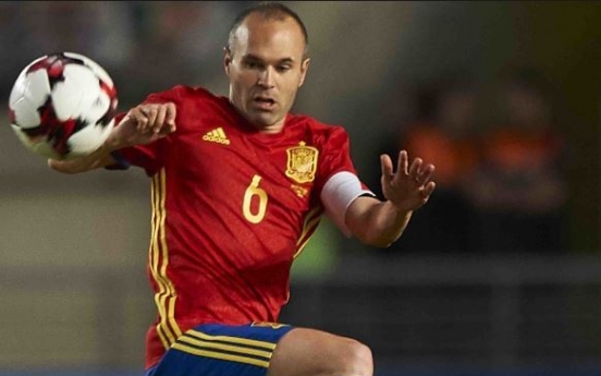 Former Spain playmaker Iniesta makes debut in Japan