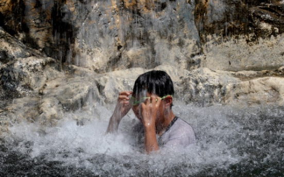 [Weather] Searing summer heat to continue until weekend