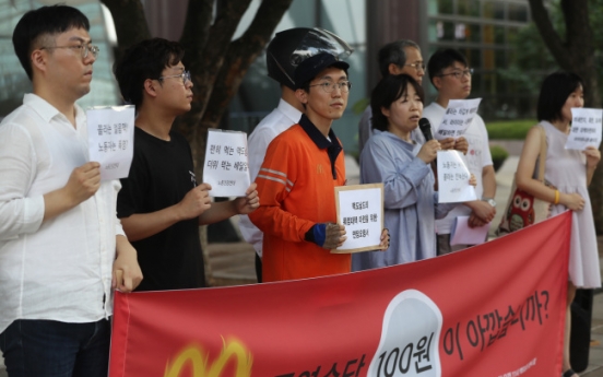 McDelivery riders protest stifling dress code