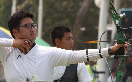 Kim Woo-jin wins gold in men's recurve archery