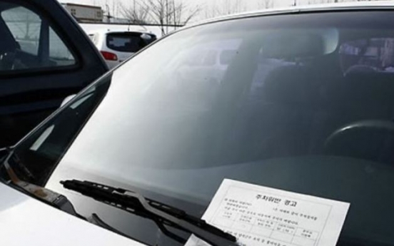 Car owner apologizes for tantrum over parking sticker