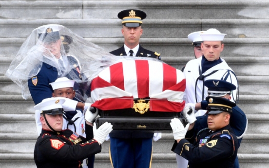 McCain ends 81-year journey with burial at Naval Academy