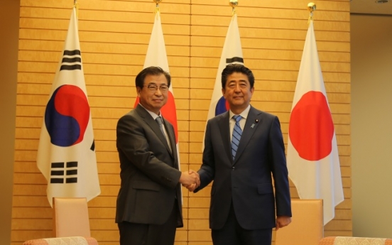 S. Korean spy agency chief briefs Abe on N. Korea trip