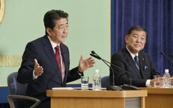 Abe aims to rewrite Japan constitution as he seeks 3rd term