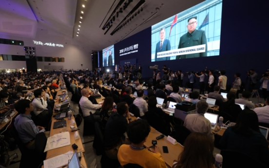 Journalists cover inter-Korean summit with measured excitement