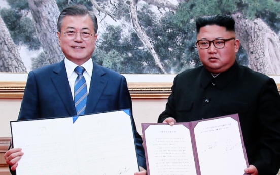 Kim vows to visit Seoul, dismantle nuke, missile sites