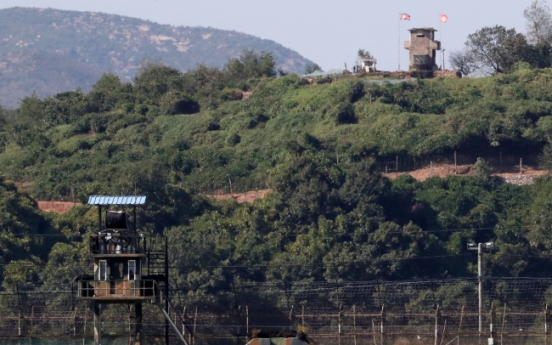 Two Koreas begin removing landmines inside DMZ