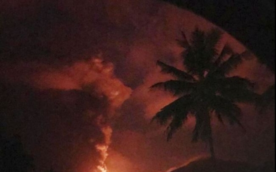 Volcano erupts on same Indonesian island as earlier quake