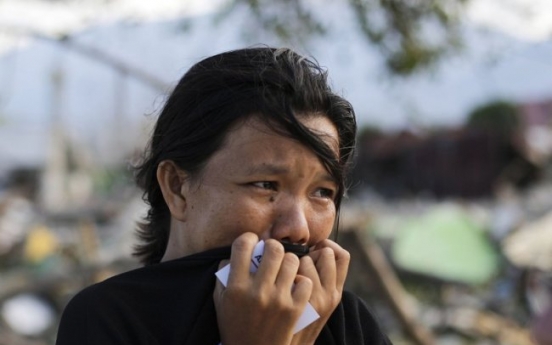 10 minutes of terror: A quake, a tsunami and a missing son