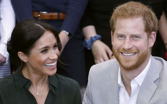 Prince Harry and Meghan expecting their 1st child in spring