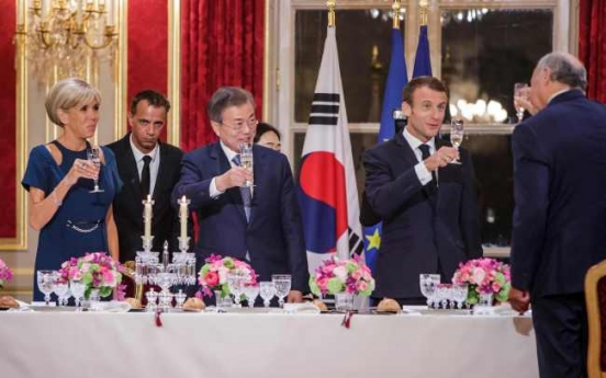 Moon says France, UN can speed up NK's denuclearization by easing sanctions