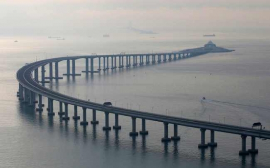 China opens mega bridge linking Hong Kong to mainland