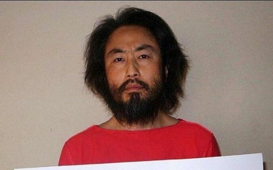 Japan journalist freed from Syrian captivity says he’s safe