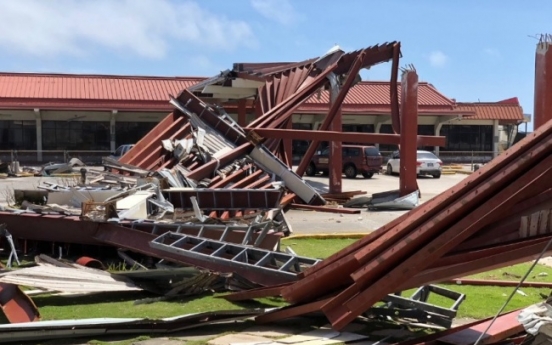 Typhoon crumbles homes, kills 1 in Northern Mariana Islands