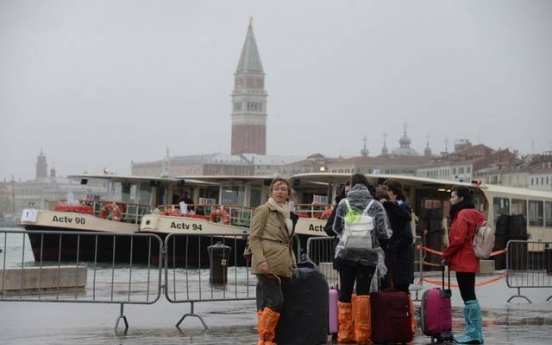 Venice hit by high tide as Italy buffeted by winds; 6 killed