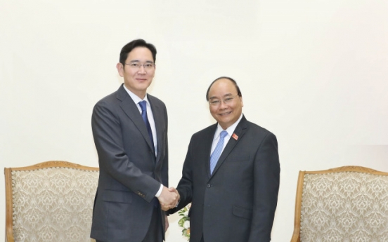 Samsung chief vows to expand investment in Vietnam