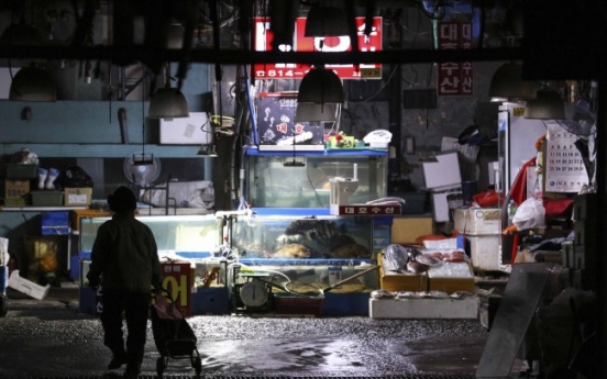 Fishmongers refuse to move out of old market despite power, water cuts