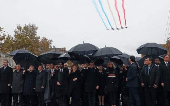 World leaders mark WWI centenary in sombre Paris ceremony