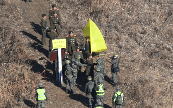 In a first for the two Koreas, inspectors verify removal of front-line guard posts