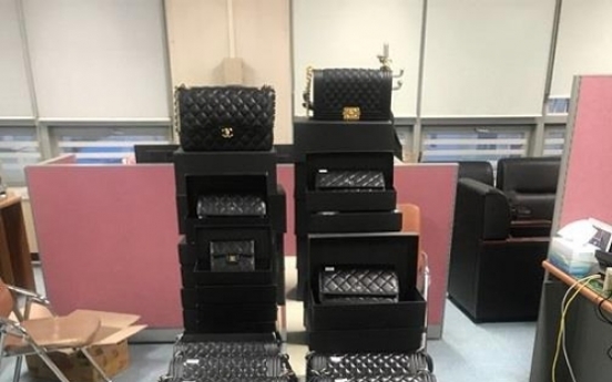 Japanese, Korean arrested for importing fake Chanel bags from Italy